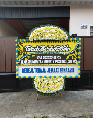 Papan Bunga Duka di Pudak